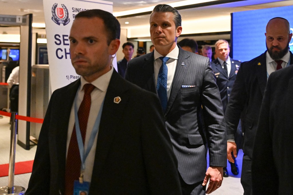 US Secretary of Defense Pete Hegseth (C) arrives for a bilateral meeting with Singapore's Minister for Defence Chan Chun Sing on the sidelines of the Shangri-La Dialogue Summit in Singapore on May 29, 2026. (Photo by JAM STA ROSA / AFP)