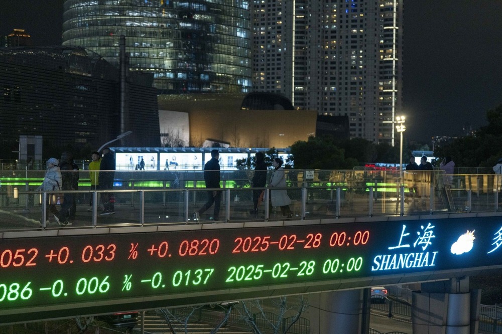 An electronic ticker displays stock figures in Pudong's Lujiazui Financial District in Shanghai. Bloomberg An electronic ticker displays stock figures in Pudong's Lujiazui Financial District in Shanghai. Bloomberg