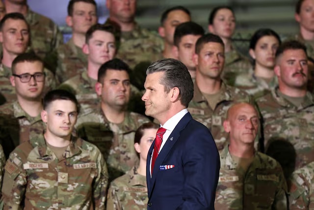 U.S. Defense Secretary Pete Hegseth walks during an event at Selfridge Air National Guard Base in Harrison Township, Michigan, U.S., April 29, 2025. REUTERS/Evelyn Hockstein/File Photo 