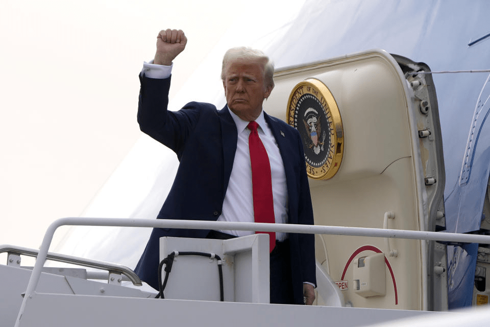 President Donald Trump gestures as he boards Air Force One en route to Florida at Harry Reid International Airport in Las Vegas, Saturday, Jan. 25, 2025. (AP Photo/Mark Schiefelbein) President Donald Trump gestures as he boards Air Force One en route to Florida at Harry Reid International Airport in Las Vegas, Saturday, Jan. 25, 2025. (AP Photo/Mark Schiefelbein)