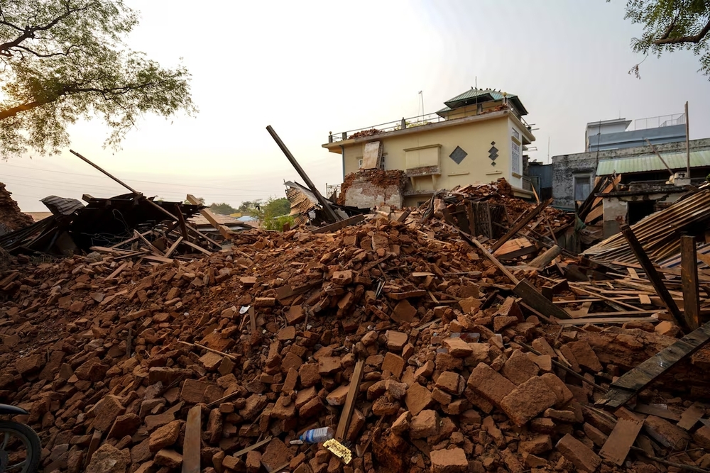 Rubble lies near a damaged building following a strong earthquake in Pyawbwe township, Mandalay, Myanmar. (Reuters) Rubble lies near a damaged building following a strong earthquake in Pyawbwe township, Mandalay, Myanmar. (Reuters)