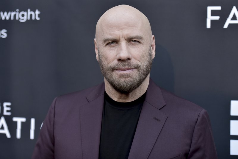 US actor John Travolta attends the LA premiere of The Fanatic at the Egyptian Theatre in Los Angeles in August 2019.. US actor John Travolta attends the LA premiere of The Fanatic at the Egyptian Theatre in Los Angeles in August 2019..