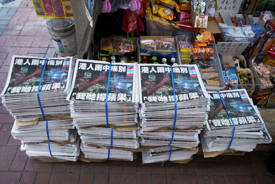 Copies of the final edition of Apple Daily, published by Next Digital, are seen at a newsstand, June 24, 2021. Copies of the final edition of Apple Daily, published by Next Digital, are seen at a newsstand, June 24, 2021.