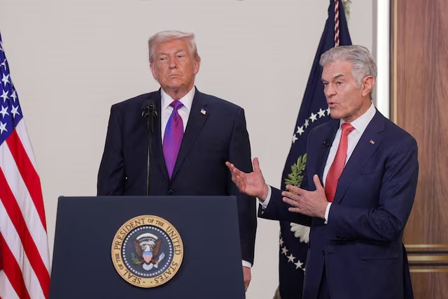 U.S. President Donald Trump listens as Dr. Mehmet Oz, Administrator for the Centers for Medicare and Medicaid Services, speaks during an event to unveil the TrumpRx drug discount site, in the South Court Auditorium on the White House campus, in Washington, D.C., U.S., February 5, 2026. REUTERS/Al Drago/File Photo 