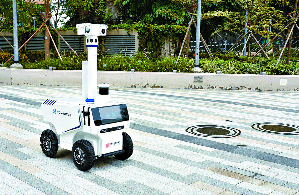Patrol robot assists in the daily security patrols of the estates. Below: with IoT, vehicle sensors in designated disability parking spaces automatically update availability, helping management staff oversee the proper use of these designated parking