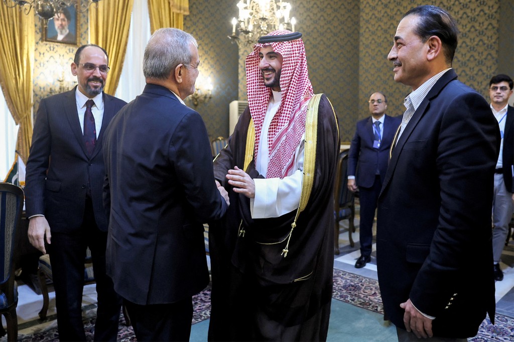 Photo by - / IRANIAN PRESIDENCY / AFP This handout picture provided by the Iranian presidency shows Iran's President Masoud Pezeshkian (C-L) shaking hands with Saudi Arabia's Defence Minister Prince Khalid bin Salman Al-Saud after a meeting with the Pakistani army chief and the Turkish intelligence chief in Tehran on October 26, 2026.