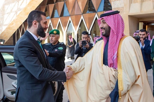 FILE - In this photo provided by the Saudi Ministry of Media, Saudi Crown Prince Mohammed bin Salman, right, greets Syria's interim President Ahmad al-Sharaa during his arrival at the royal palace in Riyadh, Saudi Arabia, Feb. 2, 2025. (Saudi Ministry of Media via AP, File)[ASSOCIATED PRESS]