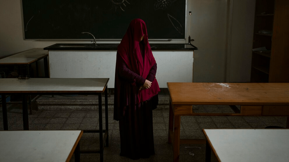Nabela, who was detained by Israeli forces, poses for a portrait at the U.N. school where she is sheltering in Rafah, southern Gaza Strip, Friday, Feb. 23, 2024. Like many Palestinians in Gaza, Nabela thought she had found a safe place to shelter in a U.N. school. Then, the Israeli army arrived. She says soldiers stormed the school, ordering men to strip to their underwear and hauling women to a nearby mosque for strip searches. So began six harrowing weeks in Israeli custody that she says included repeated beatings and interrogations. (AP Photo/Fatima Shbair) Nabela, who was detained by Israeli forces, poses for a portrait at the U.N. school where she is sheltering in Rafah, southern Gaza Strip, Friday, Feb. 23, 2024. Like many Palestinians in Gaza, Nabela thought she had found a safe place to shelter in a U.N. school. Then, the Israeli army arrived. She says soldiers stormed the school, ordering men to strip to their underwear and hauling women to a nearby mosque for strip searches. So began six harrowing weeks in Israeli custody that she says included repeated beatings and interrogations. (AP Photo/Fatima Shbair)