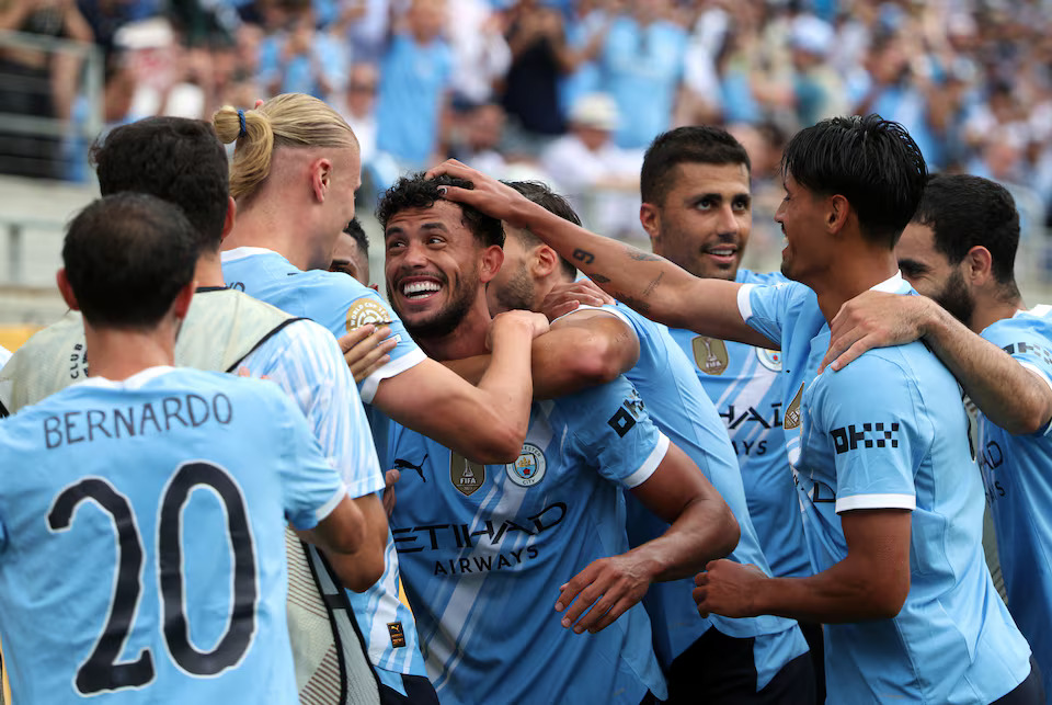 Soccer Football - FIFA Club World Cup - Group G - Juventus v Manchester City - Camping World Stadium, Orlando, Florida, U.S. - June 26, 2025 Manchester City's Erling Haaland celebrates scoring their third goal with Manchester City's Rodri, Manchester City's Matheus Nunes and Manchester City's Tijjani Reijnders IMAGN IMAGES via Reuters/Nathan Ray Seebeck