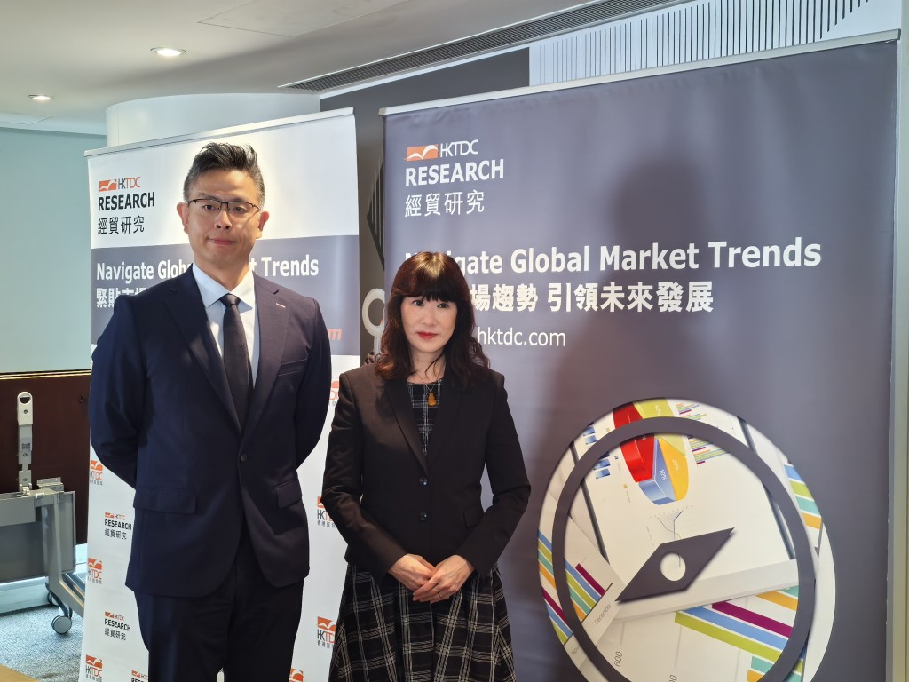 From left, Kenneth Lee, section head of special project and business advisory, and Irina Fan.