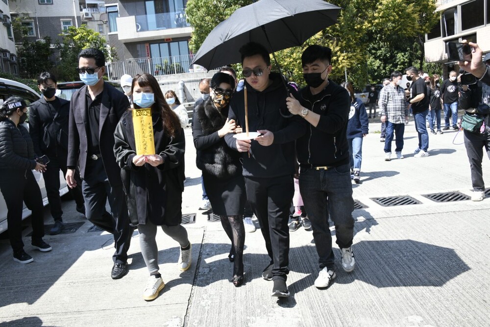 Abby Choi's husband Chris Tam and her mother are joined by relatives and friends as rituals are performed at Lung Mei Village, where the model was killed and dismembered in one of the most grisly Hong Kong crimes in recent years. SING TAO