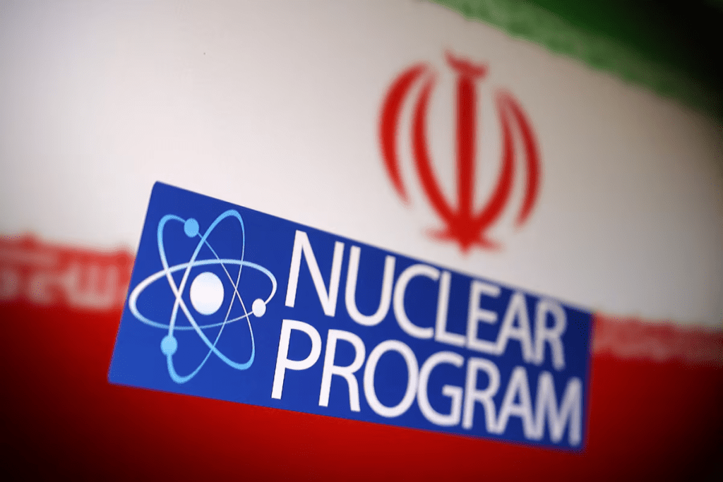 Iranian flag, atom symbol and words "Nuclear program" are in this illustration taken June 16, 2025. REUTERS/Dado Ruvic/Illustration/File Photo