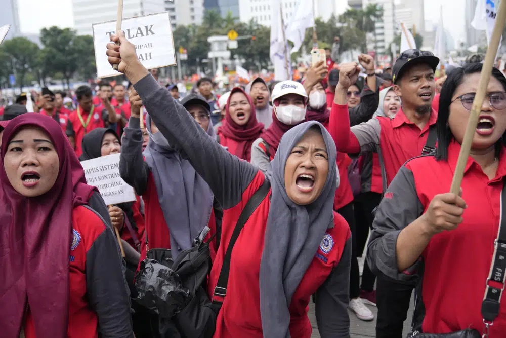 Workers shout slogans during a May Day rally in Jakarta, Indonesia, Monday, May 1, 2023. Workers and activists across Asia are marking May Day with protests calling for higher salaries and better working conditions, among other demands. (AP)