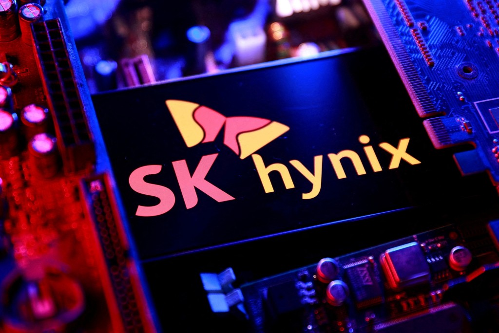 The SK Hynix logo and a computer motherboard appear in this illustration taken August 25, 2025. REUTERS/Dado Ruvic/Illustration