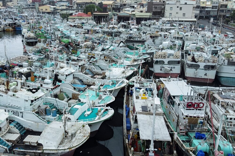 Fishing boats were crammed into a fishing habour in Taiwan's Pingtung county ahead of Typhoon Koinu's expected landfall. Fishing boats were crammed into a fishing habour in Taiwan's Pingtung county ahead of Typhoon Koinu's expected landfall.