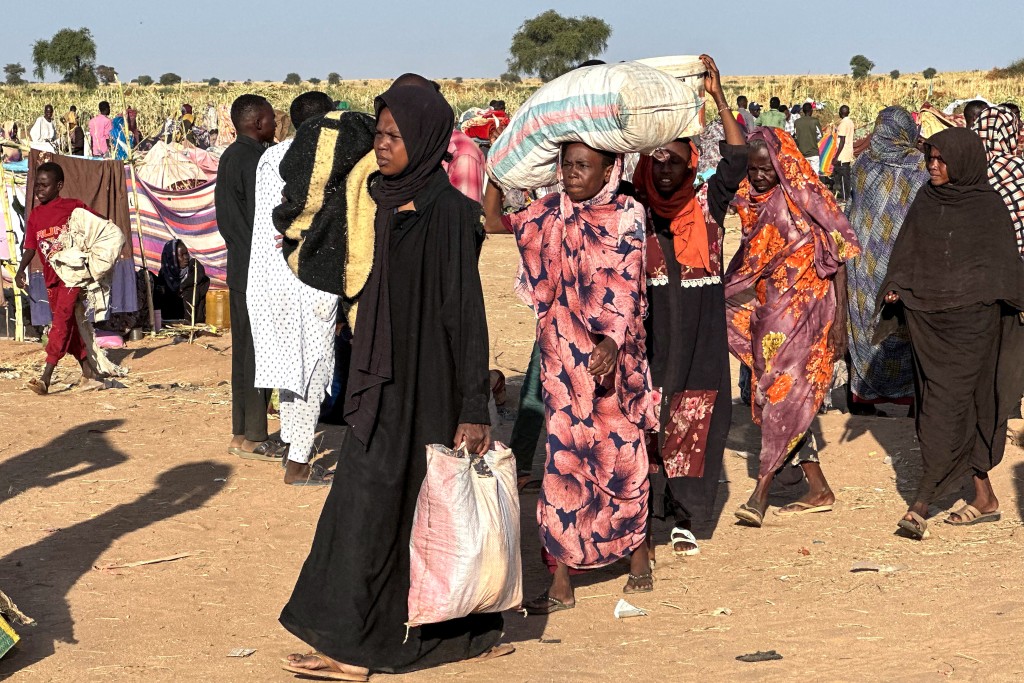 Photo by - / AFP  Displaced Sudanese who fled El-Fasher after the city fell to the Rapid Support Forces (RSF), arrive in the town of Tawila in war-torn Sudan's western Darfur region on October 28, 2025.