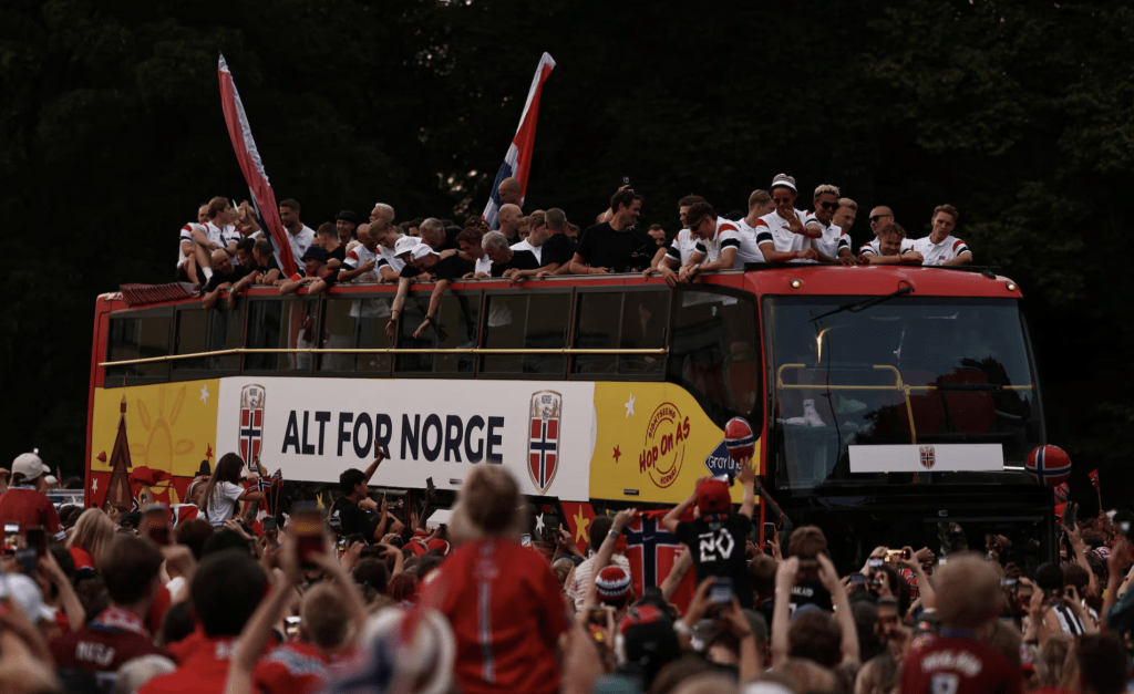 Members of the Norwegian men’s football team and their staff take part in an open-top bus parade through the streets to celebrate their performance in the World Cup after returning to Oslo, Norway, July 13, 2026. (REUTERS/Tom Little)