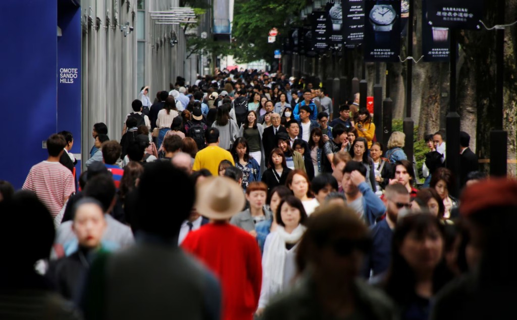 People walk in Omotesando shopping district in Tokyo, Japan May 17, 2017. Picture taken May 17, 2017. REUTERS
