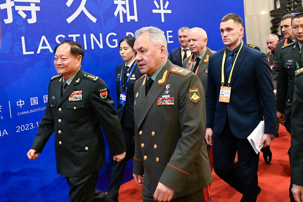 Photo by PEDRO PARDO / AFP  China's Vice Chairman of the Central Military Commission Zhang Youxia (L) and Russia's Defence Minister Sergei Shoigu arrive to the Xiangshan Forum in Beijing on October 30, 2023.