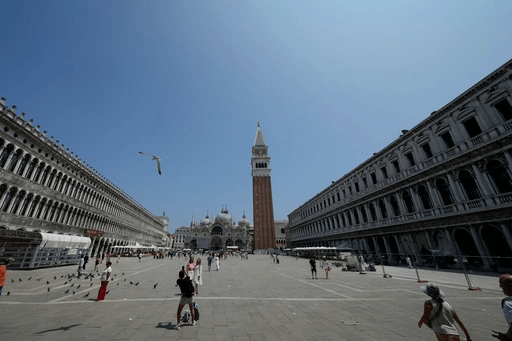 St. Mark's Square, in Venice, Italy, Thursday, June 12, 2025. (AP Photo/Luca Bruno)