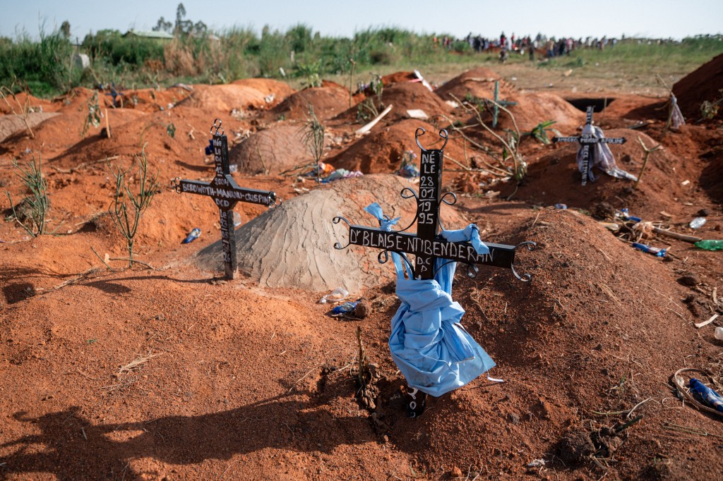 TOPSHOT - General view of Nyamurongo cemetery, located in Ndibakodu neighborhood, one of the burial sites receiving a large number of people who have died from Ebola virus disease since the beginning of the outbreak, in Bunia, Ituri Province, Democratic Republic of the Congo, on June 13, 2026. (Photo by Jospin Mwisha / AFP)