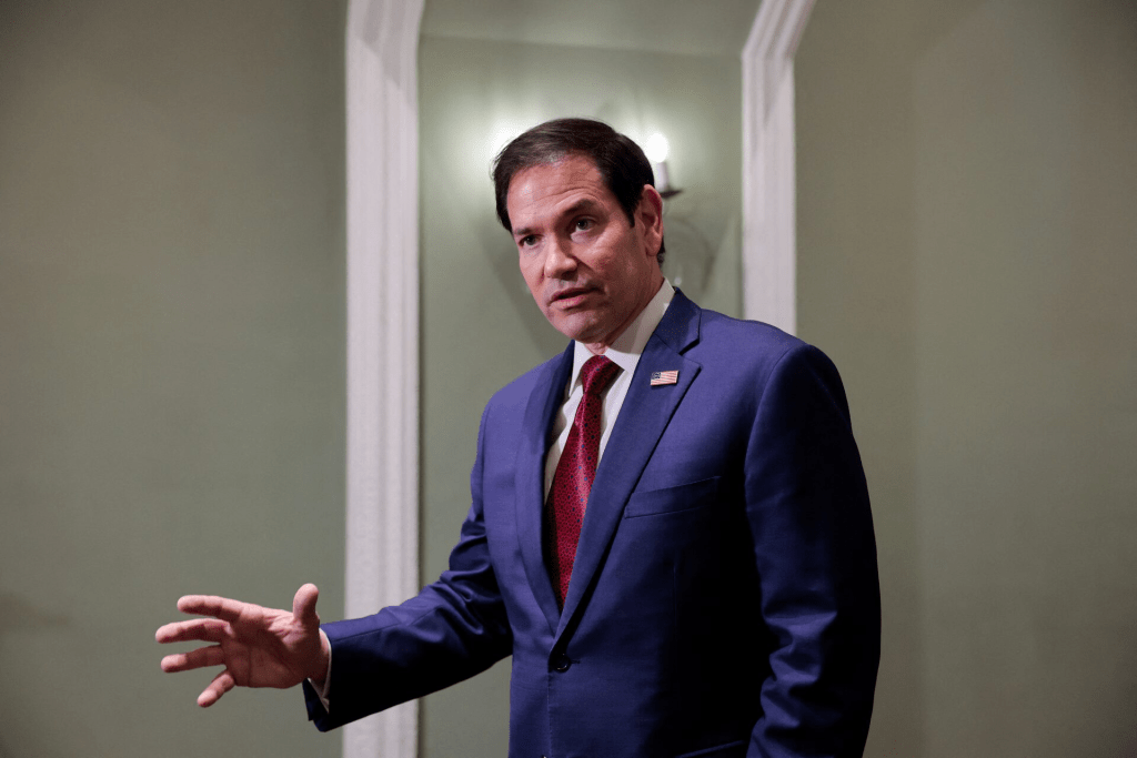 US Secretary of State Marco Rubio speaks with members of the media at the Taj Mahal Palace hotel in Mumbai, India, October 21, 2026. REUTERS/Kylie Cooper/Pool
