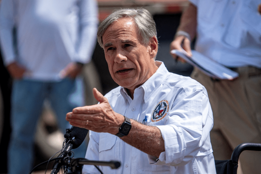 Texas Governor Greg Abbott speaks to the media at a press conference in Hunt, Texas, U.S., July 8, 2025. REUTERS/Sergio Flores/File Photo 