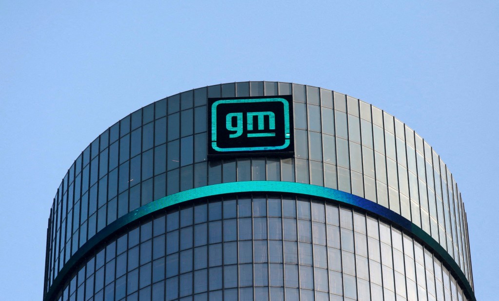 GM's logo is seen on the facade of the General Motors headquarters in Detroit, Michigan, U.S., March 16, 2021.  REUTERS/Rebecca Cook/File Photo