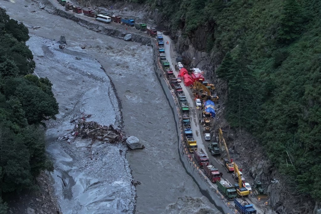 A drone view shows excavators and rescue equipment at the core disaster-hit area at Gyirong Port following the August 26 mudslide, in Shigatse, Tibet Autonomous Region, China September 1, 2026. cnsphoto via REUTERS