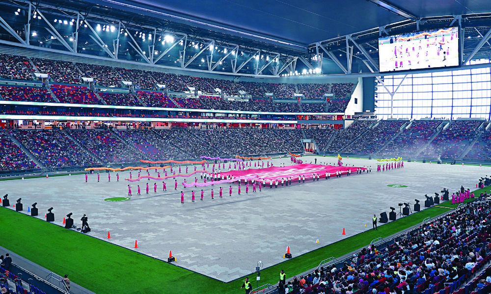 The 50,000-seat main stadium can host large-scale sports and entertainment events. Left: local Chan says he knows outside food and drinks cannot be brought into the venue. SING TAO The 50,000-seat main stadium can host large-scale sports and entertainment events. Left: local Chan says he knows outside food and drinks cannot be brought into the venue. SING TAO