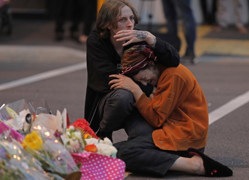 In this March 16, 2019, file photo, mourners pay their respects at a makeshift memorial near the Masjid Al Noor mosque in Christchurch, New Zealand. In this March 16, 2019, file photo, mourners pay their respects at a makeshift memorial near the Masjid Al Noor mosque in Christchurch, New Zealand.