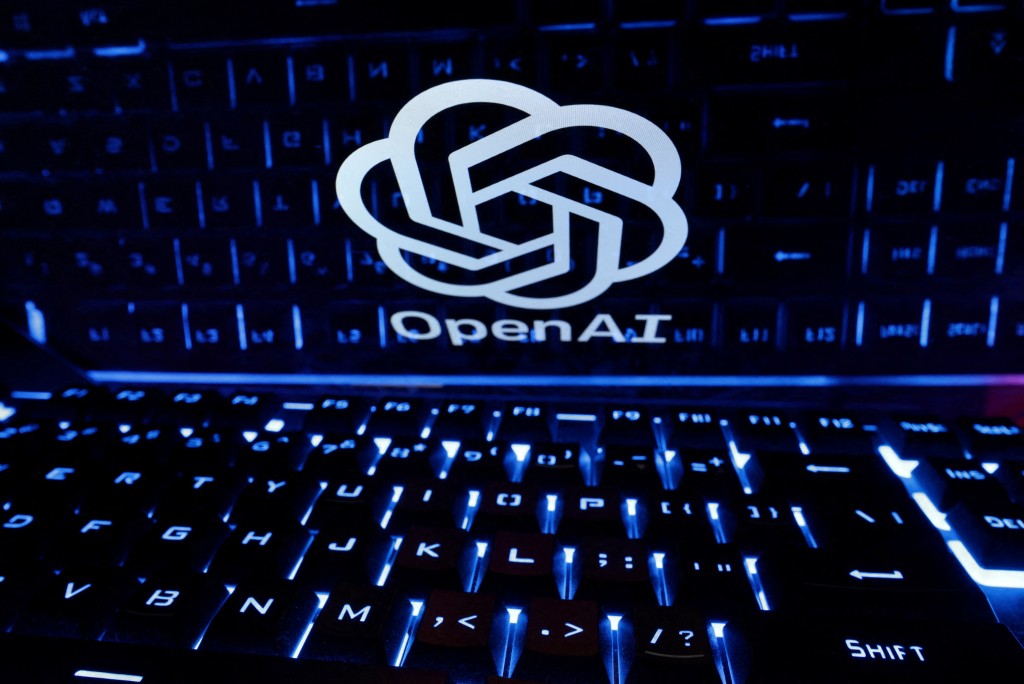 A keyboard is placed in front of a displayed OpenAI logo in this illustration taken February 21, 2023. REUTERS