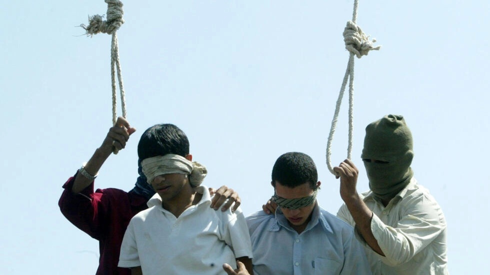 Blindfolded Mahmoud Asgari, 16, left, and another unidentified teenager are set to be publicly hanged, in Mashhad, Iran, on charges of raping boys in this photo taken on July 19, 2005. ASSOCIATED PRESS - STR Blindfolded Mahmoud Asgari, 16, left, and another unidentified teenager are set to be publicly hanged, in Mashhad, Iran, on charges of raping boys in this photo taken on July 19, 2005. ASSOCIATED PRESS - STR