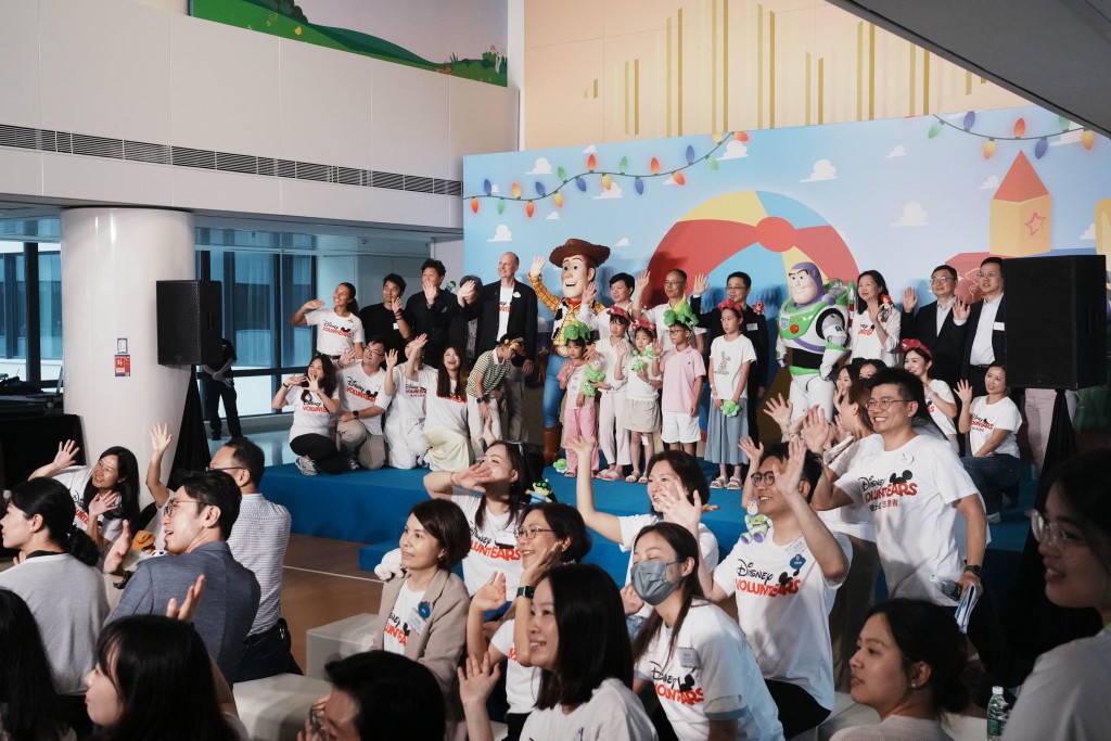 Toy Story icons Woody and Buzz Lightyear make a surprise appearance at the grand opening of the ‘Disney V-Care Space.’