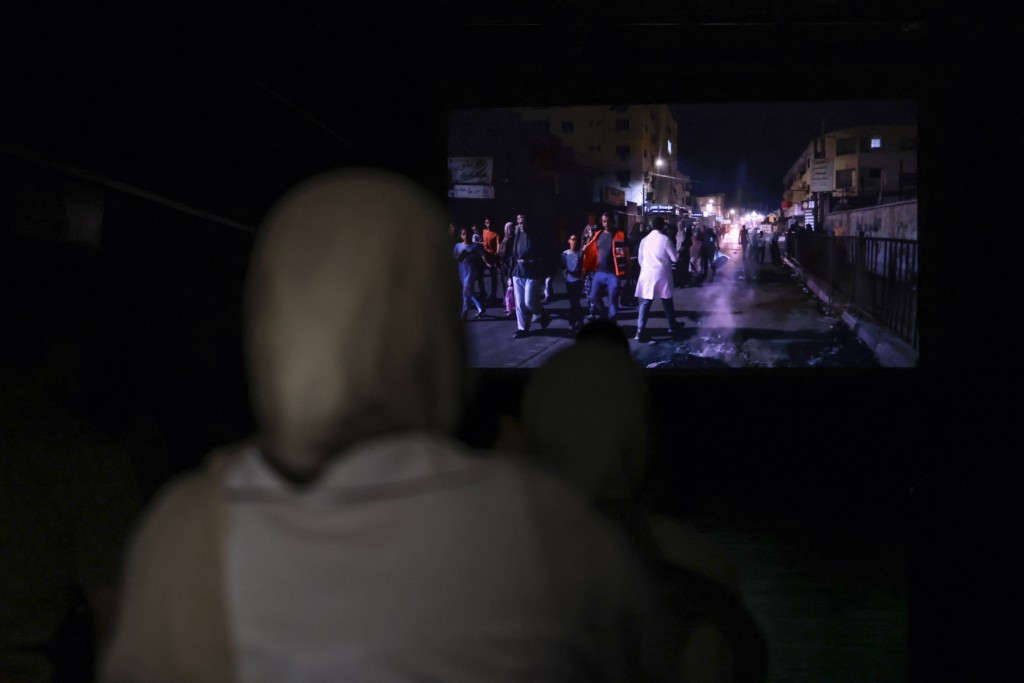 Palestinians watch the 2025 documentary film "Janin (fetus)، Jenin" by the late Palestinian actor and director Mohammed Bakri at The Freedom Theatre in the northern city of Jenin, in the Israeli-occupied Palestinian West Bank on September 10, 2026.