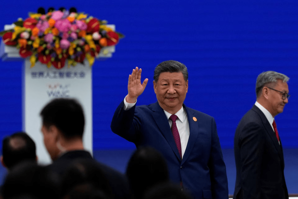 Chinese President Xi Jinping waves as he arrives at the opening ceremony for the World AI Conference in Shanghai, China, July 17, 2026. Ng Han Guan/Pool via REUTERS/File Photo