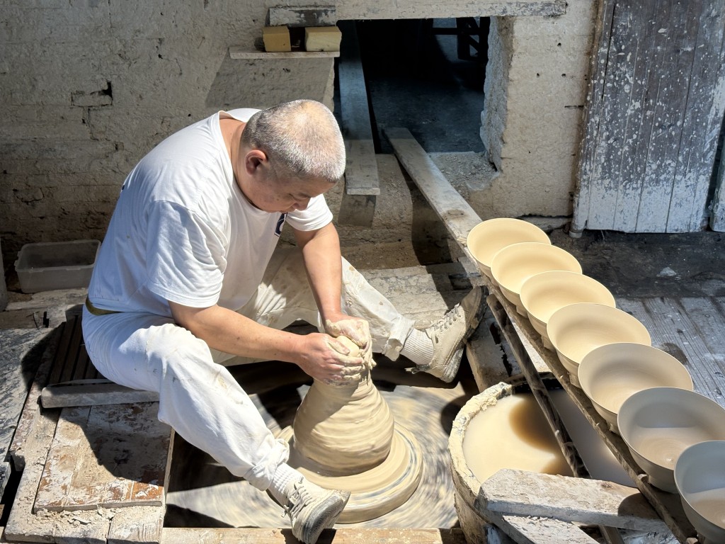Porcelain blanks before firing, where precise heat is essential to achieve the desired finish. 