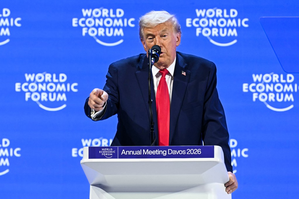 US President Donald Trump gestures as he delivers a special address during the World Economic Forum (WEF) annual meeting in Davos on January 21, 2026. (AFP)