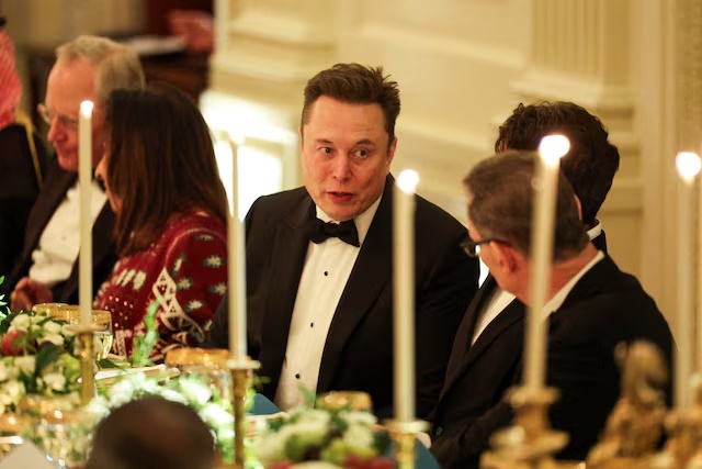 Elon Musk attends a dinner hosted by U.S. President Donald Trump for Saudi Crown Prince and Prime Minister Mohammed bin Salman, at the White House in Washington, D.C., U.S., November 18, 2025. REUTERS/Tom Brenner
