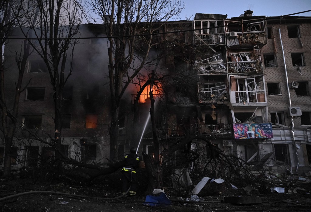 A firefighter works at the site of an apartment building hit during a Russian drone and missile strike, amid Russia's attack on Ukraine, in Zaporizhzhia, Ukraine August 30, 2025. (Reuters)