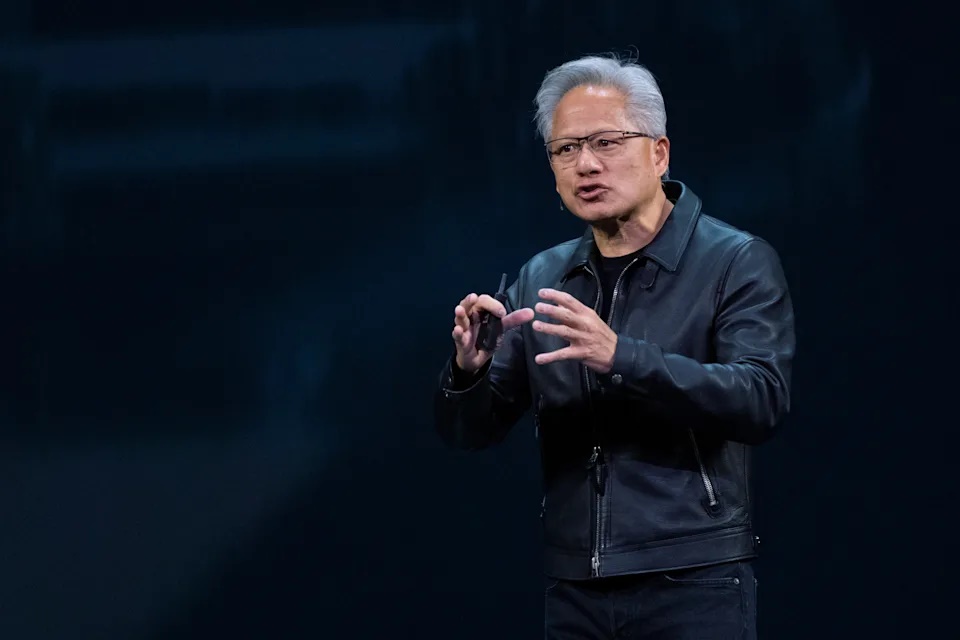 NVIDIA CEO Jensen Huang speaks on how AI infrastructure and AI factories that generate intelligence at scale are powering a new industrial revolution, at Washington Convention Center, Tuesday, Oct. 28, 2025, in Washington. (AP Photo/Manuel Balce Ceneta) · Associated Press Finance
