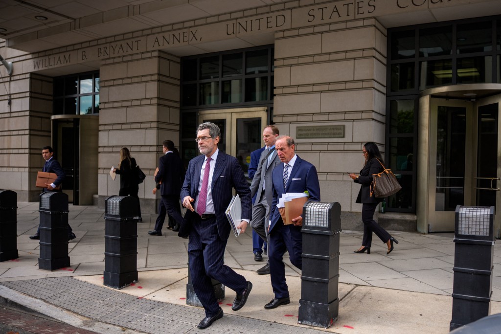 Attorneys Norman Eisen (L) and Abbe Lowell (R), representing Federal Reserve Governor Lisa Cook, depart federal court on August 29, 2025 in Washington, DC. A preliminary hearing concluded without a ruling on Federal Reserve Governor Lisa Cook's bid to block U.S. President Donald Trump from firing her. Andrew Harnik/Getty Images/AFP (Photo by Andrew Harnik / GETTY IMAGES NORTH AMERICA / Getty Images via AFP)