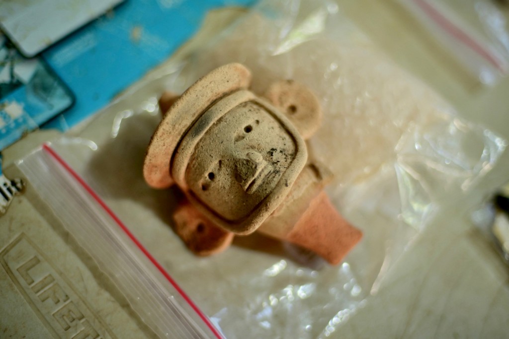 Photo by MARCO ANTONIO MARTINEZ / AFP  A view shows an anthropomorphic whistle face handled by archaeologists working at an archaeological site in Coatepec, Veracruz, Mexico, on June 18, 2026.