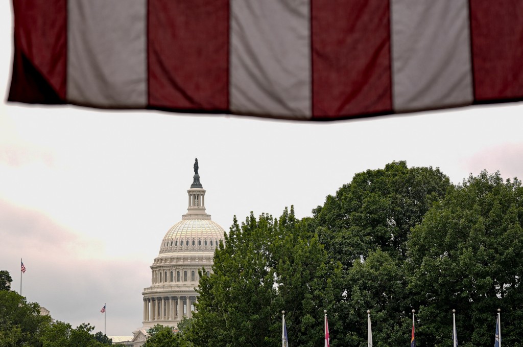 A U.S. flag is draped at Union Station with the U.S. Capitol dome in the background on the day of a meeting of U.S. Senators, as Republican lawmakers struggle to pass U.S. President Donald Trump’s sweeping spending and tax bill, on Capitol Hill in Washington, D.C., U.S., June 28, 2025. (Reuters)