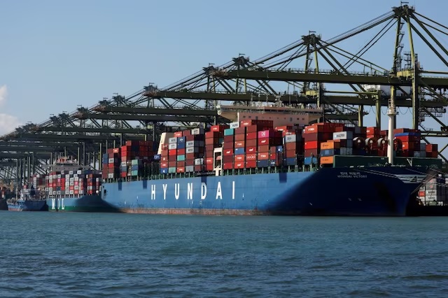 Container ships are berthed at PSA's Pasir Panjang Terminal in Singapore July 15, 2019. Picture taken July 15, 2019. REUTERS/Edgar Su/File Photo Container ships are berthed at PSA's Pasir Panjang Terminal in Singapore July 15, 2019. Picture taken July 15, 2019. REUTERS/Edgar Su/File Photo