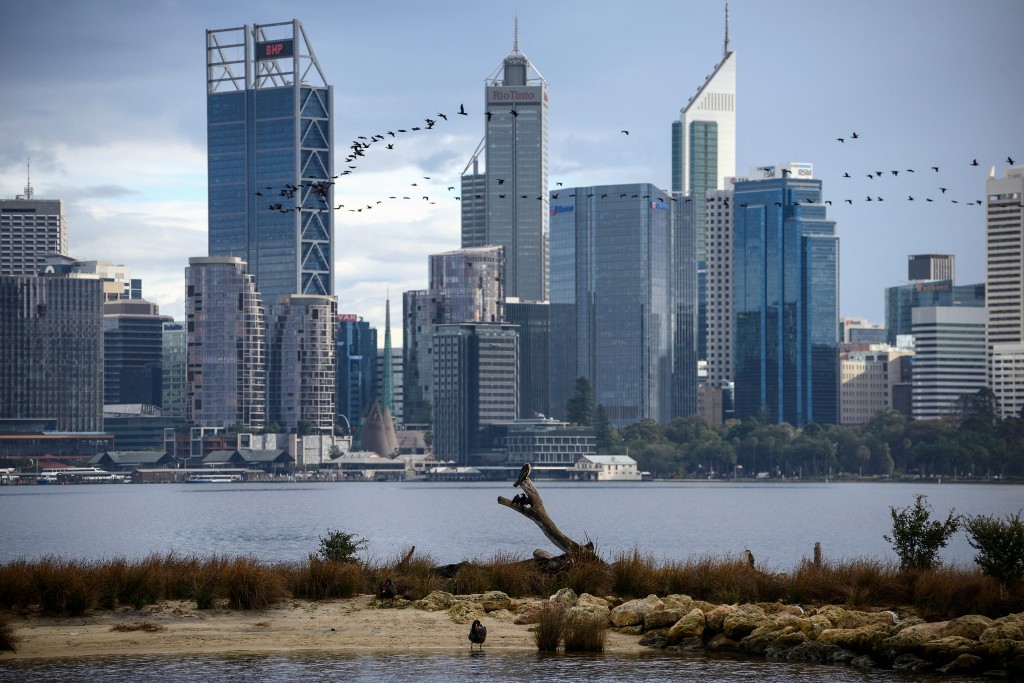 Birds are seen in front of the central business district (CBD) of Western Australia's capital city of Perth on June 22, 2026. (AFP)