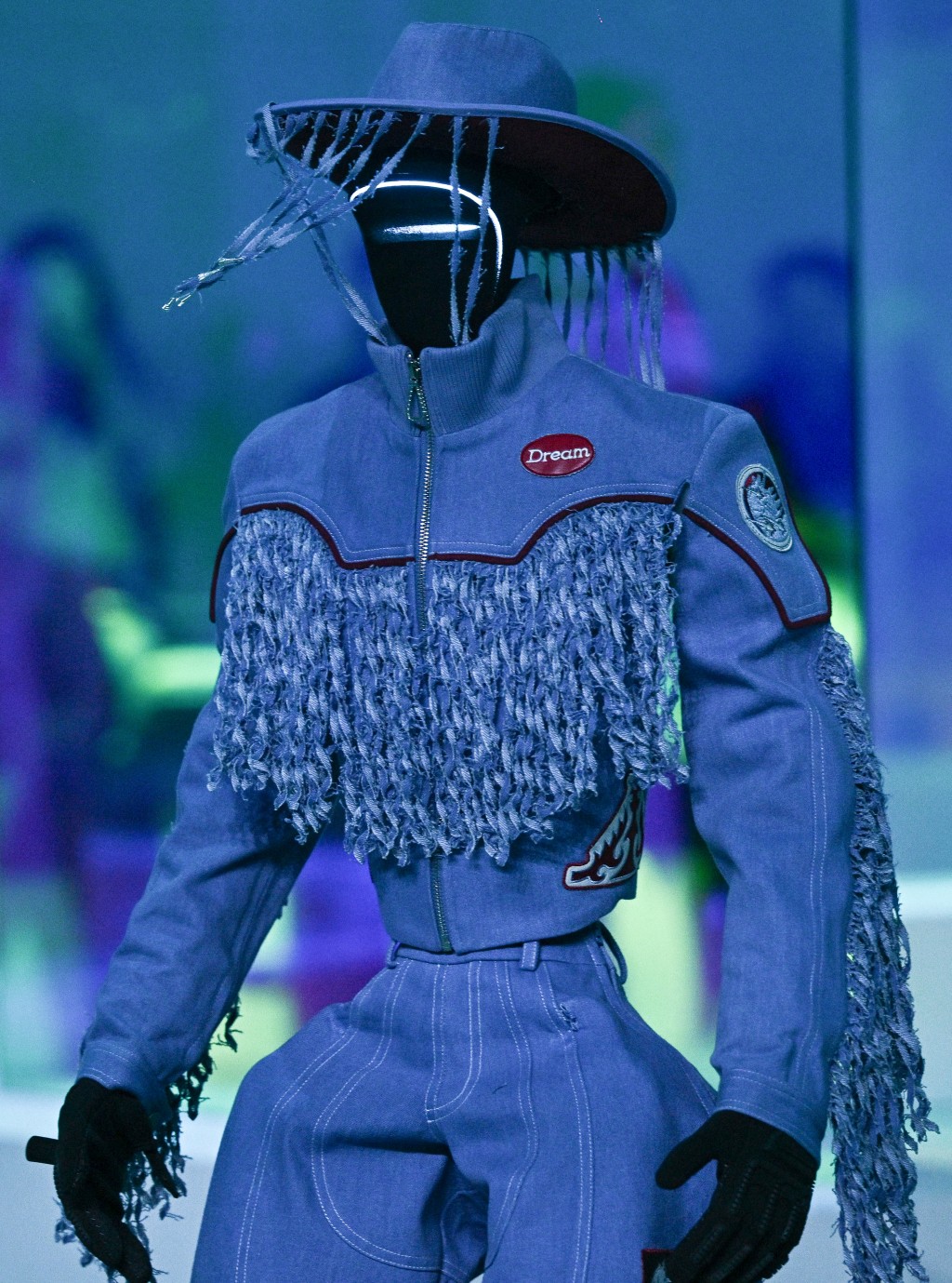 A humanoid robot presents creations at Galaxy Corporation's "Mach33: Physical AI Fashion Show" in seoul on May 28, 2026. (Photo by Pedro PARDO / AFP)
