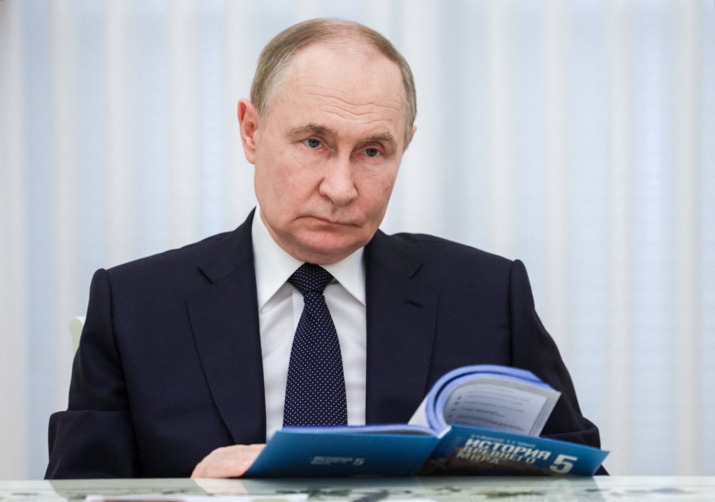 Russian President Vladimir Putin attends a meeting with editors of the federal lineup of history textbooks for grades 5 to 11 of secondary school as well as vocational schools, at the Kremlin in Moscow, Russia June 22, 2025. (Reuters)