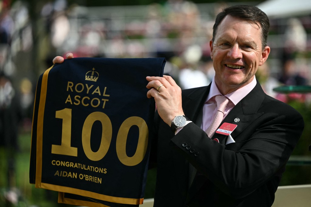 rainer Aidan O'Brien poses after training his 100th winning horse after the The Gold Cup race on the third day of the Royal Ascot horse racing meeting in Ascot, west of London, on June 18, 2026. (Photo by JUSTIN TALLIS / AFP)