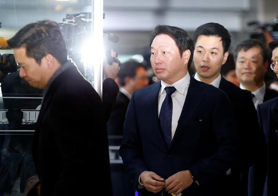 SK Group Chairman Chey Tae-won arrives to attend a hearing at the National Assembly in Seoul, South Korea, December 6, 2016. REUTERS/Kim Hong-Ji